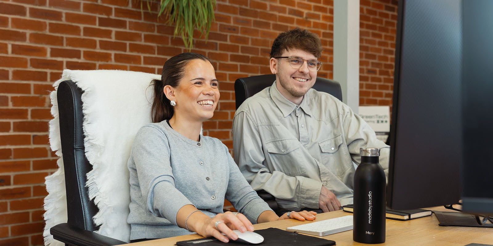 Man and woman at computer