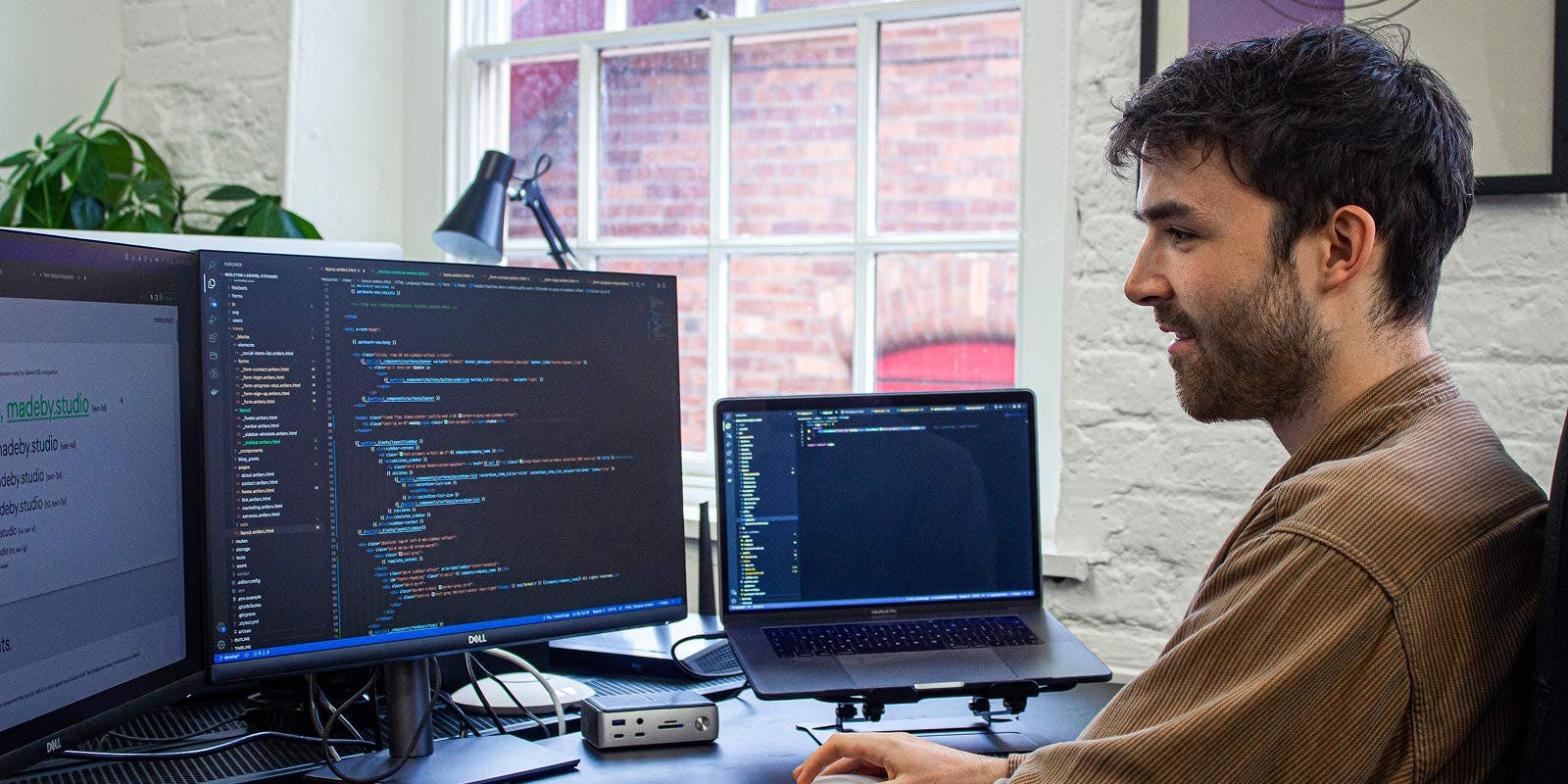 Man coding a website