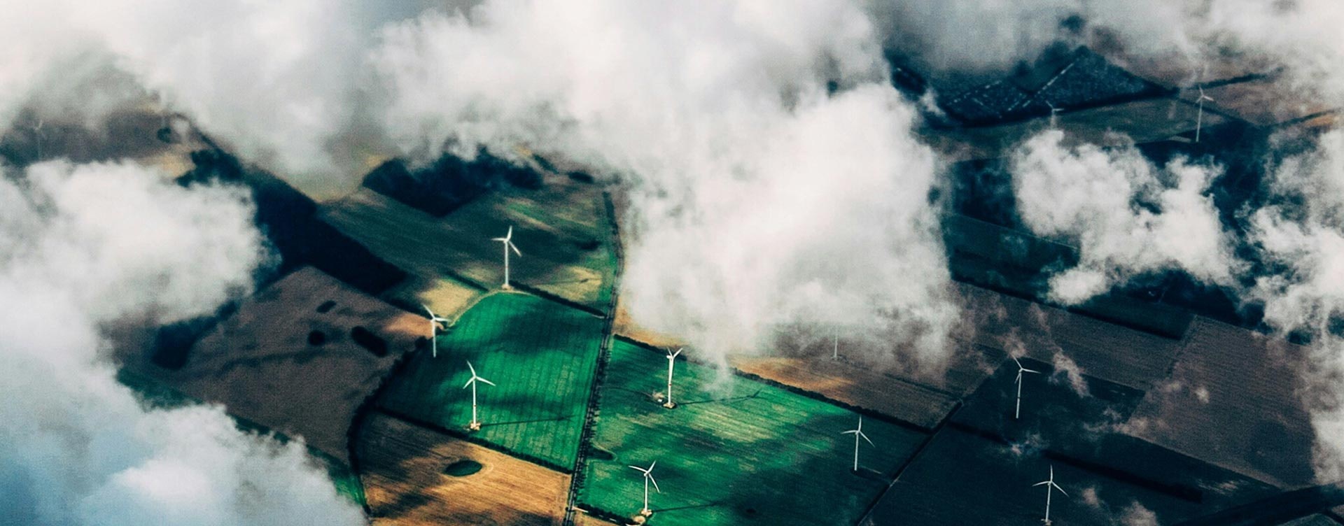 Birds eye view of clouds and fields