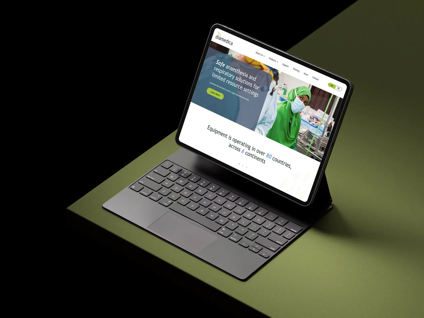 Laptop mockup of the Diamedica homepage.