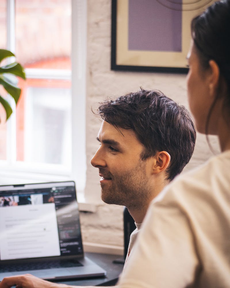Man and woman at computer
