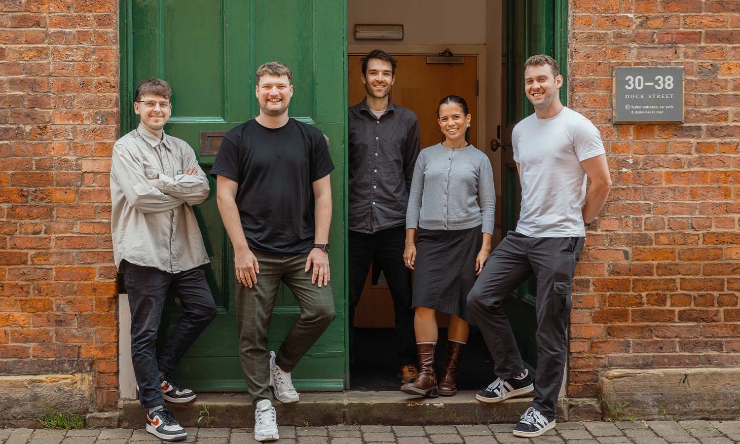 madeby.studio Team Standing in Office Doorway